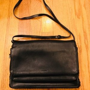 Black leather cross body All Saints Purse.